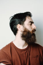 files/profile-of-a-man-with-beard-and-styled-hair_150x_1.avif
